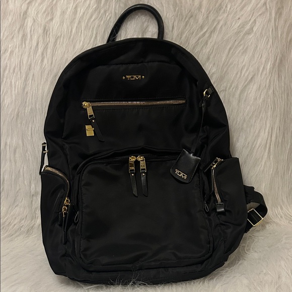 Tumi Black and Gold Backpack